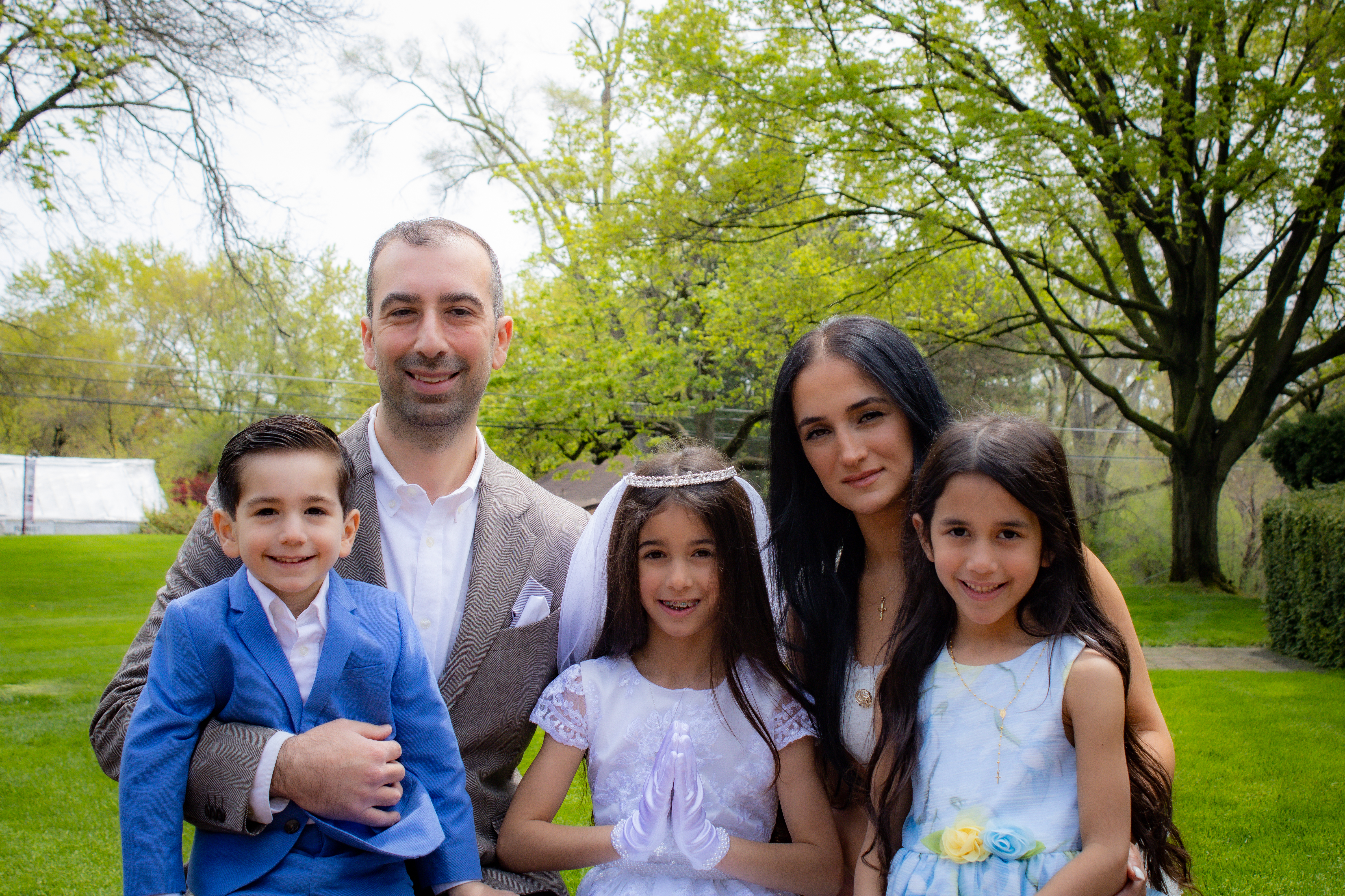 Family group portrait in spring greenery