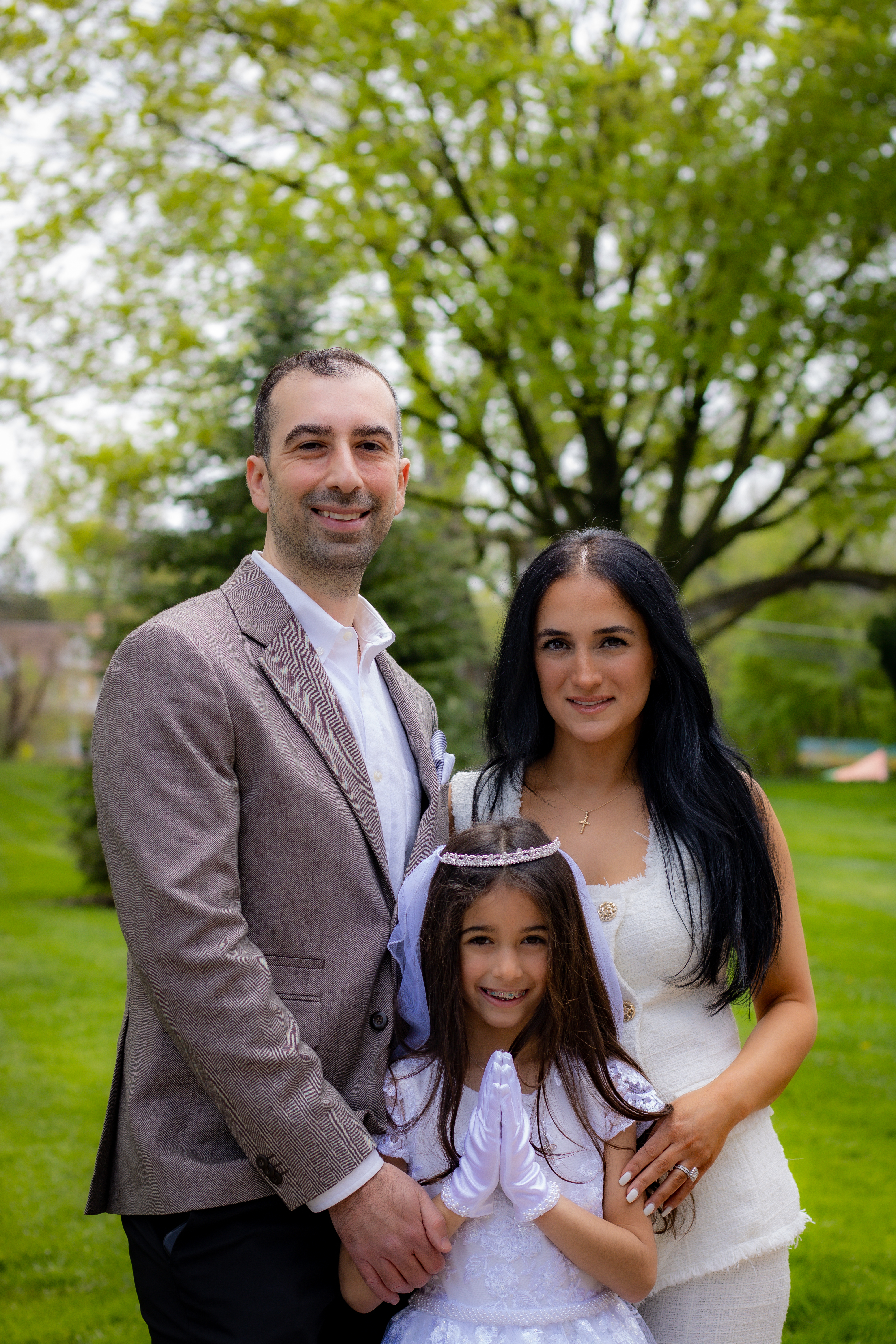 Family portrait with greenery background