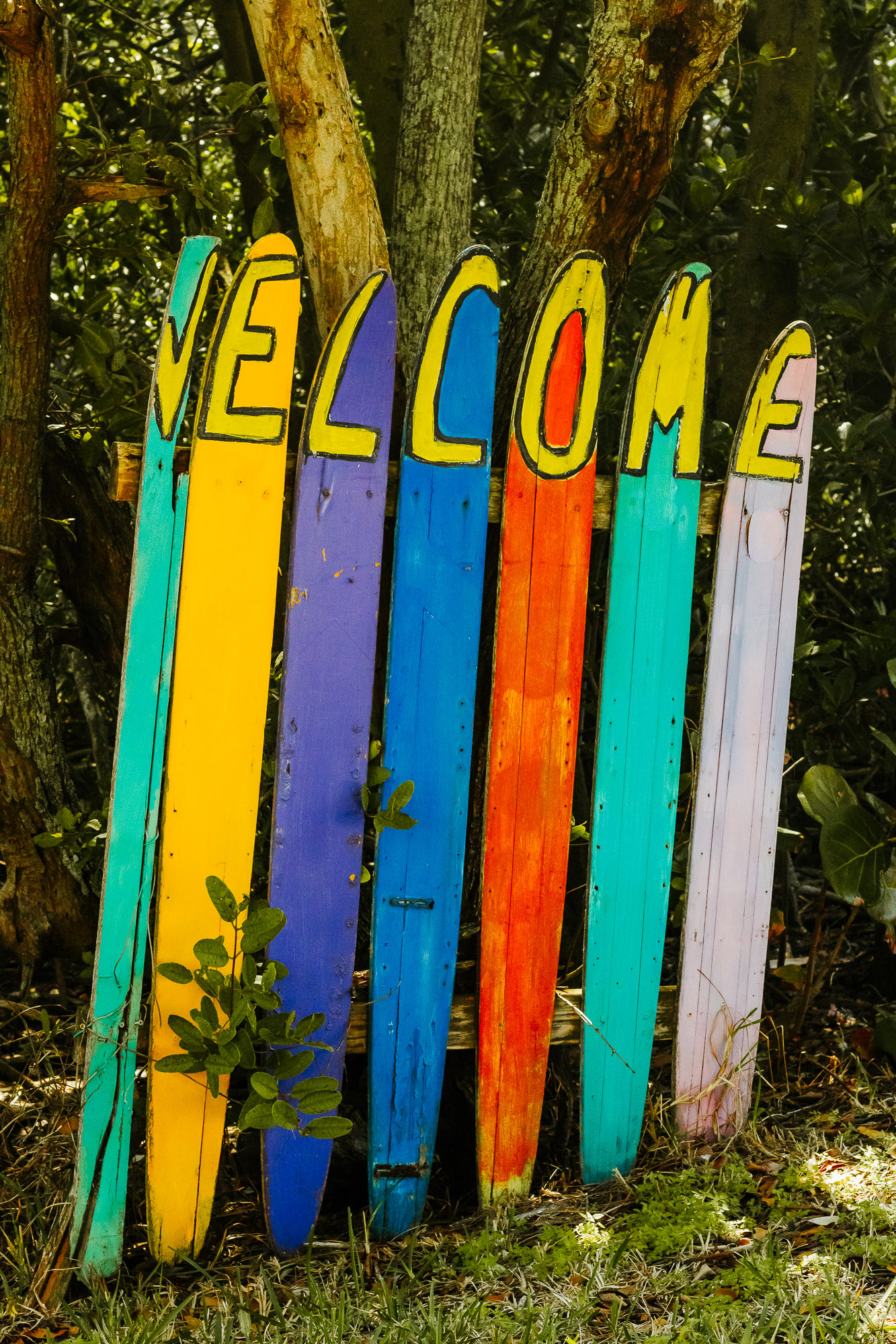 Colorful vertical mural with welcome lettering