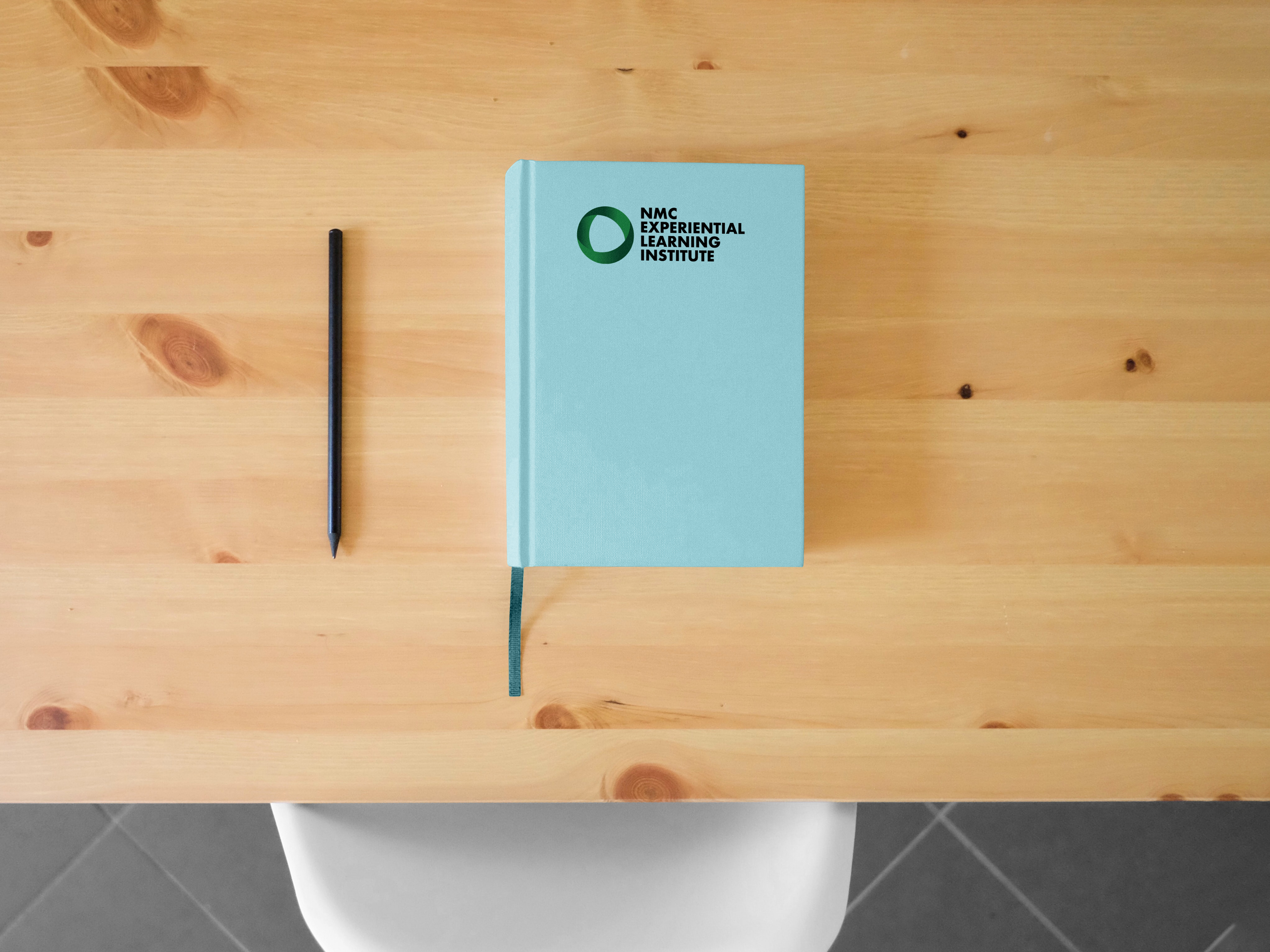 NMC ELI logo on notebook cover